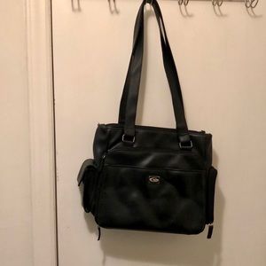 Women’s black Classics handbag with many pockets, excellent condition